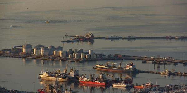 A harbour with industrial ships and buildings